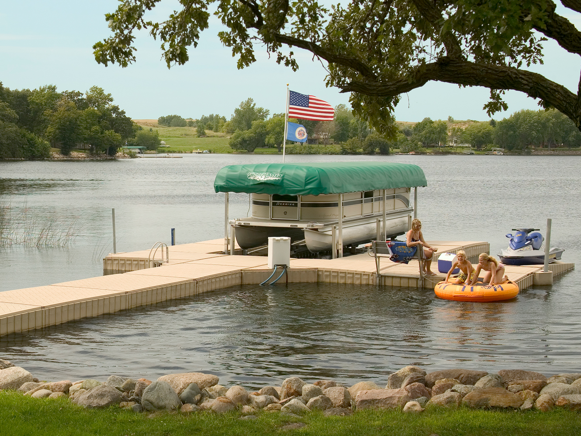 PolyDock Products with Vertical Lifts and Green Canopies