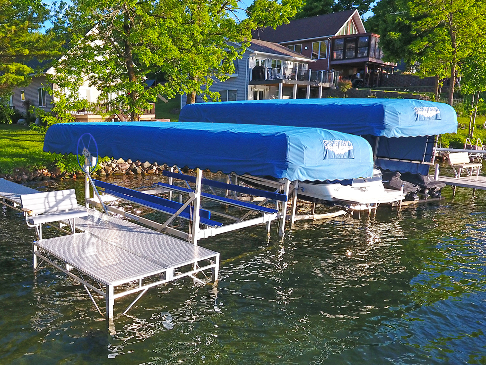 ShoreMaster Vertical Lifts with Blue Canopies and Infinity TS9 with Gray Glacier