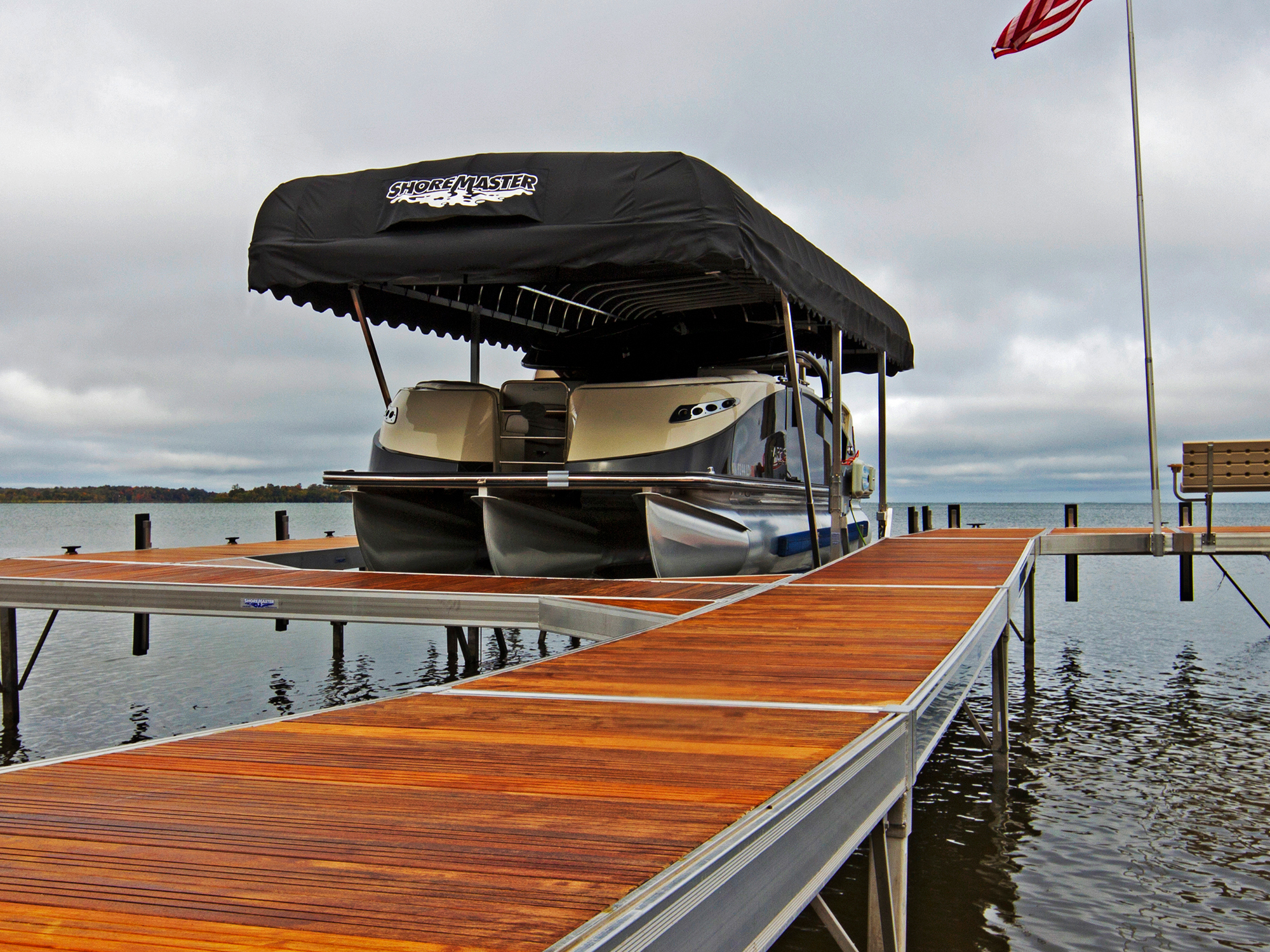 ShoreMaster RS7 Dock with IPE Decking and a Vertical Pontoon Light with Black Canopy