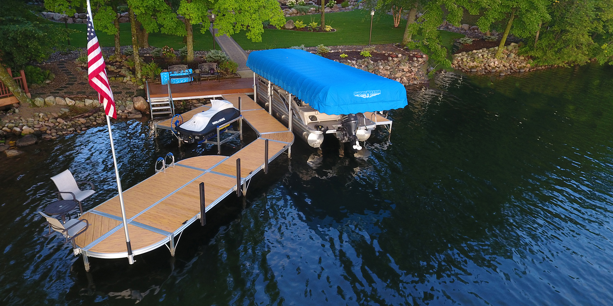 Boat on dock with American Flag